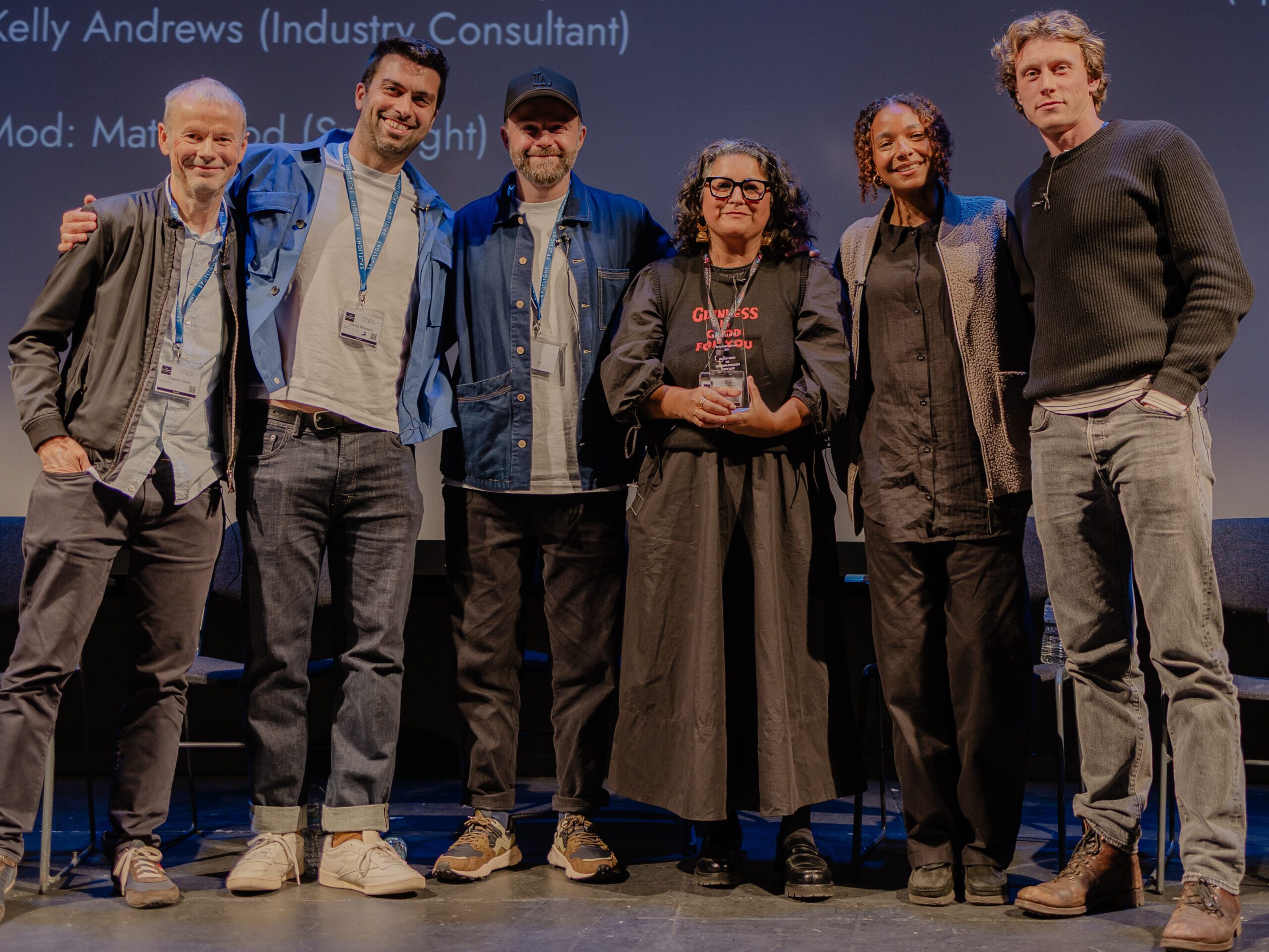 A number of people on stage at the Spotlight Conference