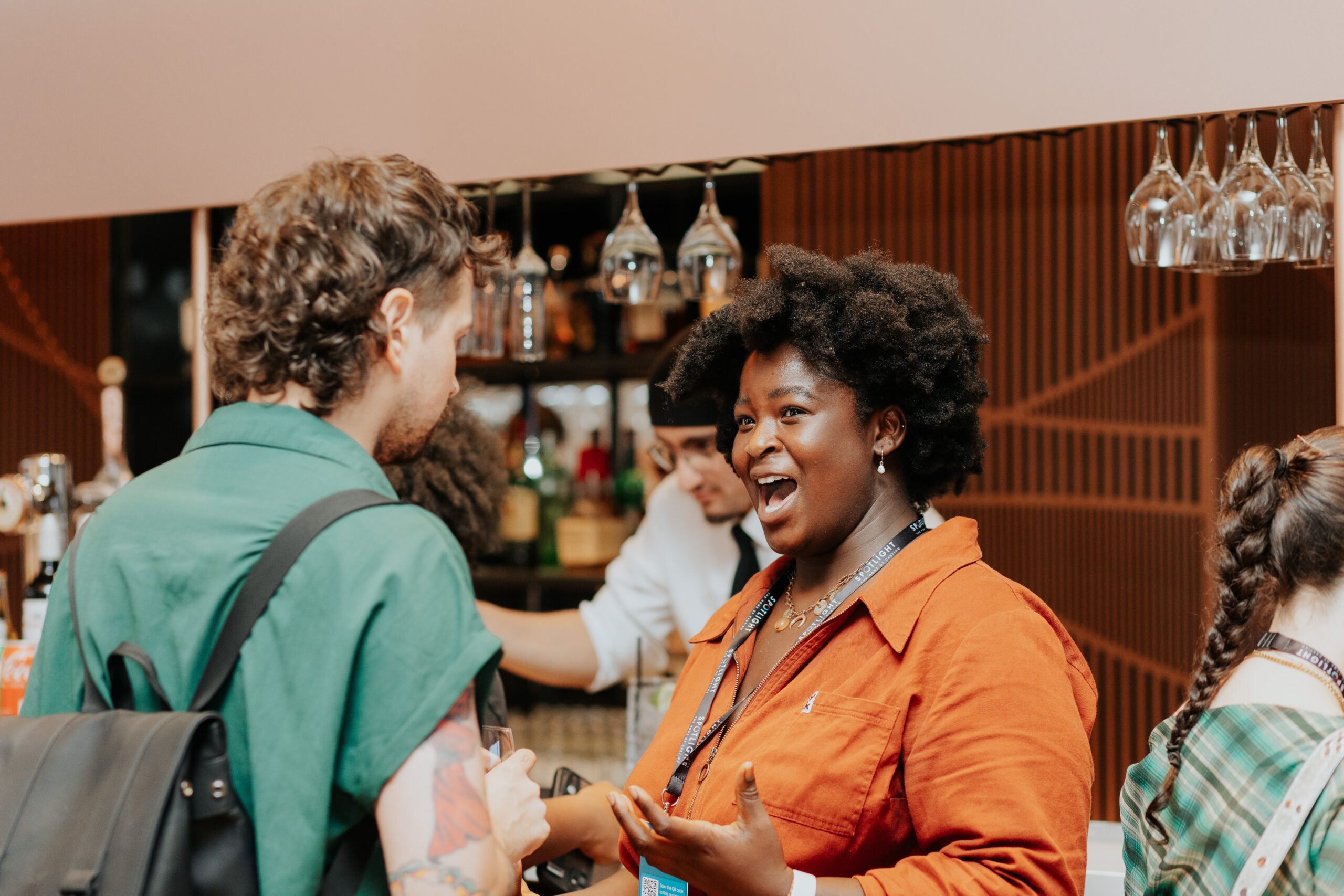 An actor and a casting director chatting at an industry event