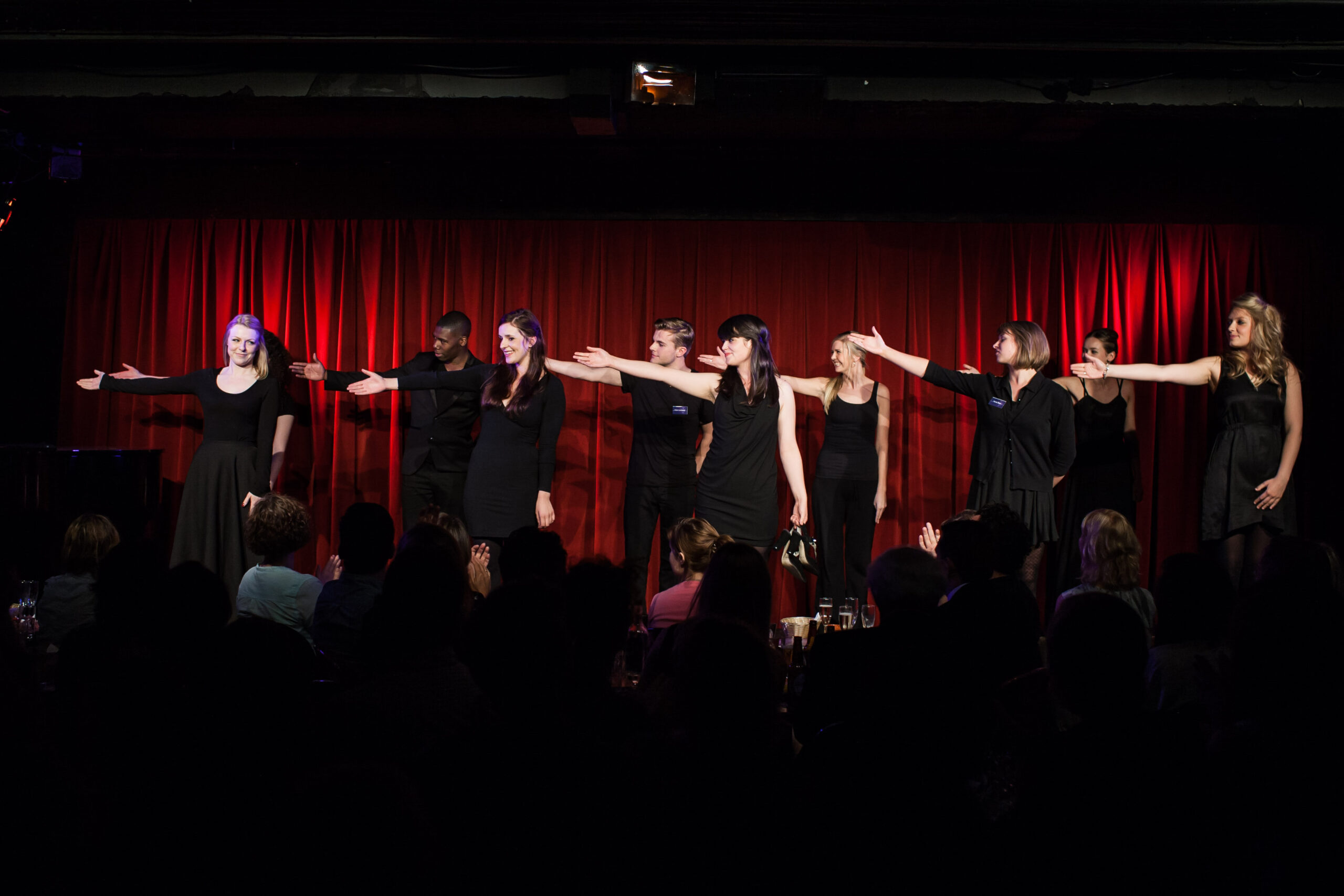 A group of performers on a stage