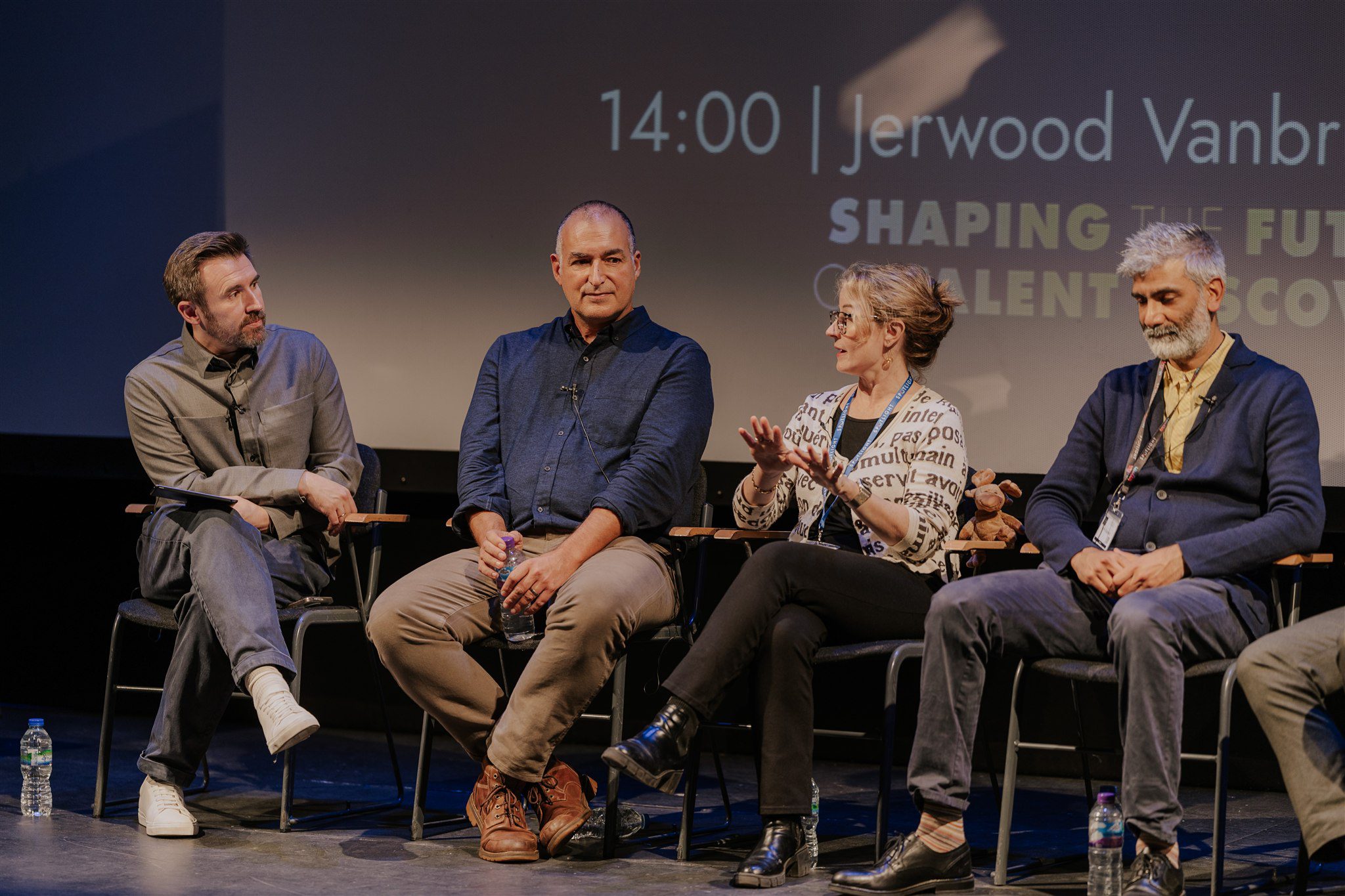 David Flynn hosting a panel on stage at The Spotlight Conference 2025