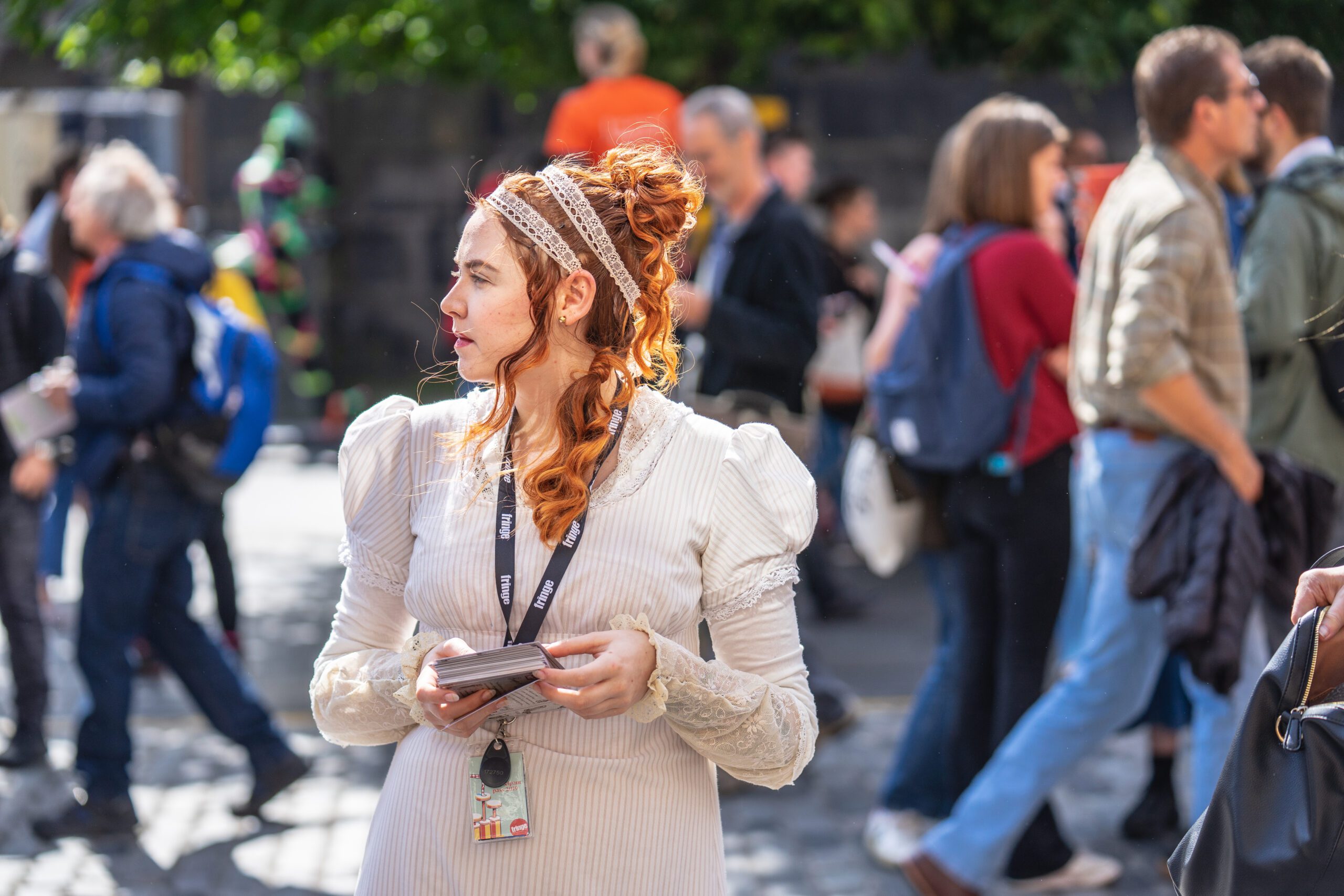 Performer at the Edinburgh Fringe flyering on the city streets